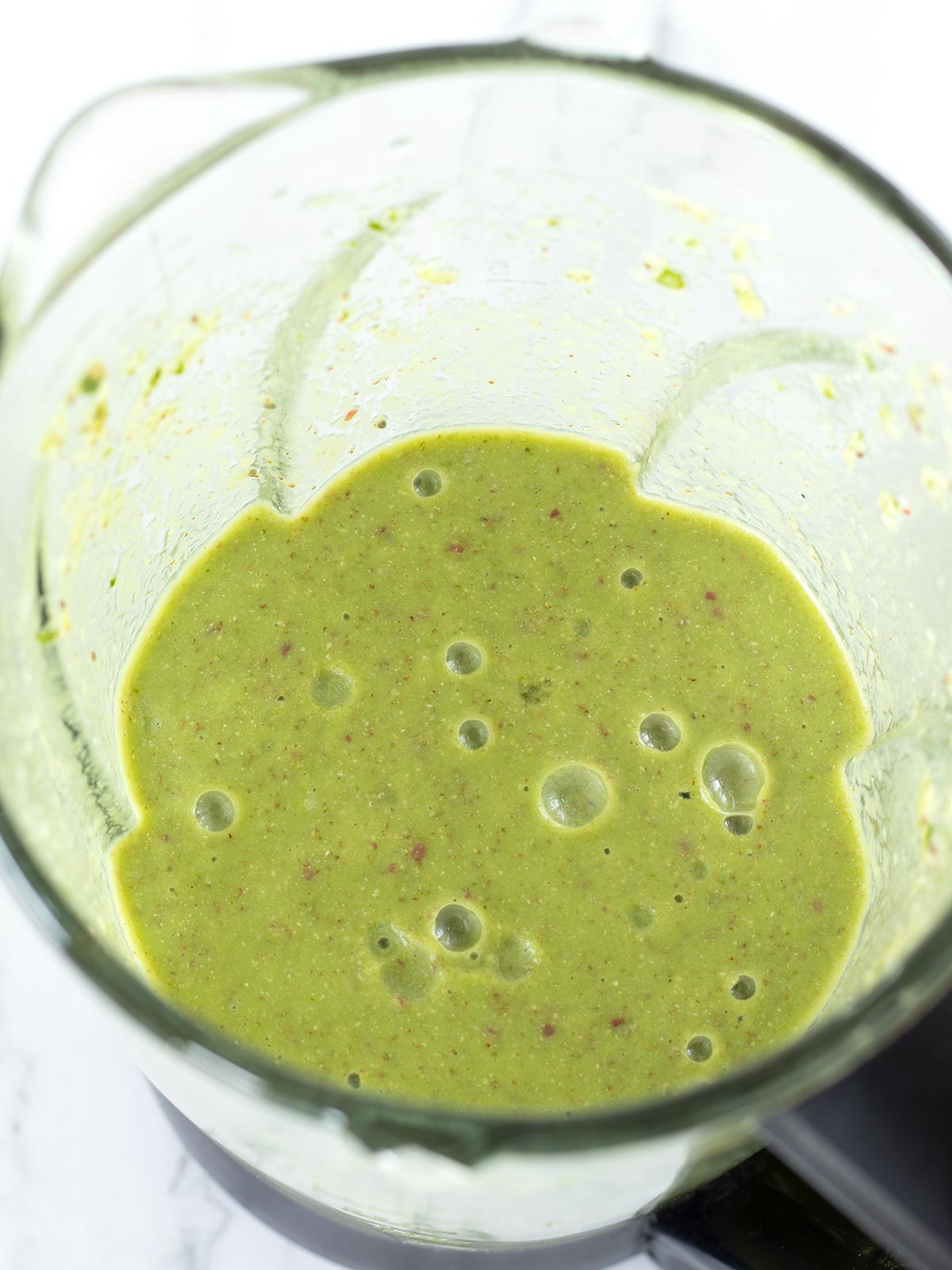 Vegan green orange spinach smoothie without banana.