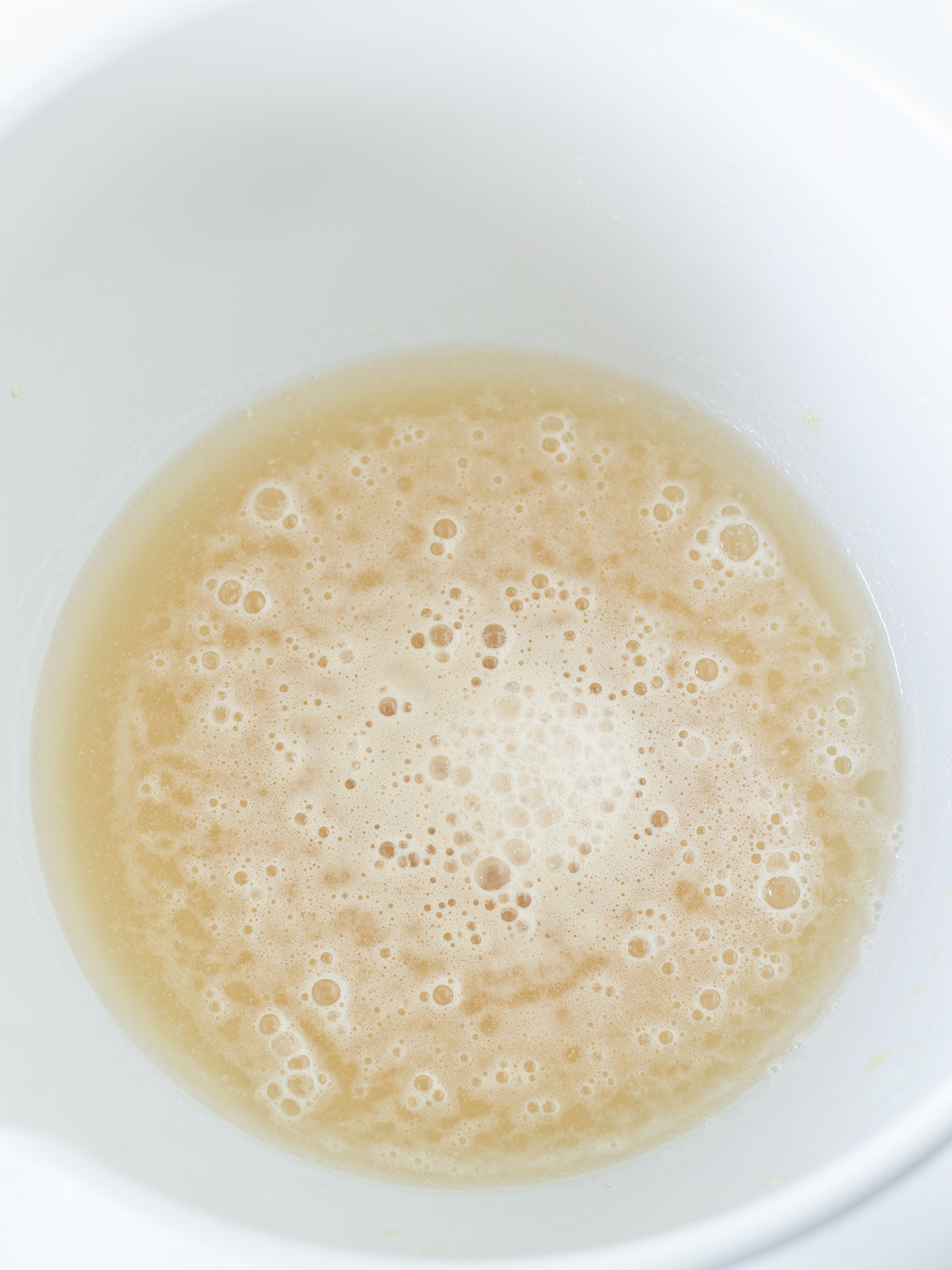 Yeast activation for vegan dinner rolls.