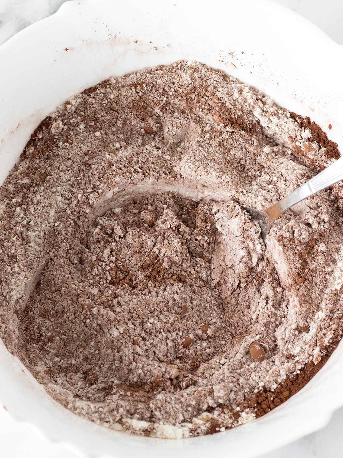 Dry ingredients for vegan chocolate walnut cake.