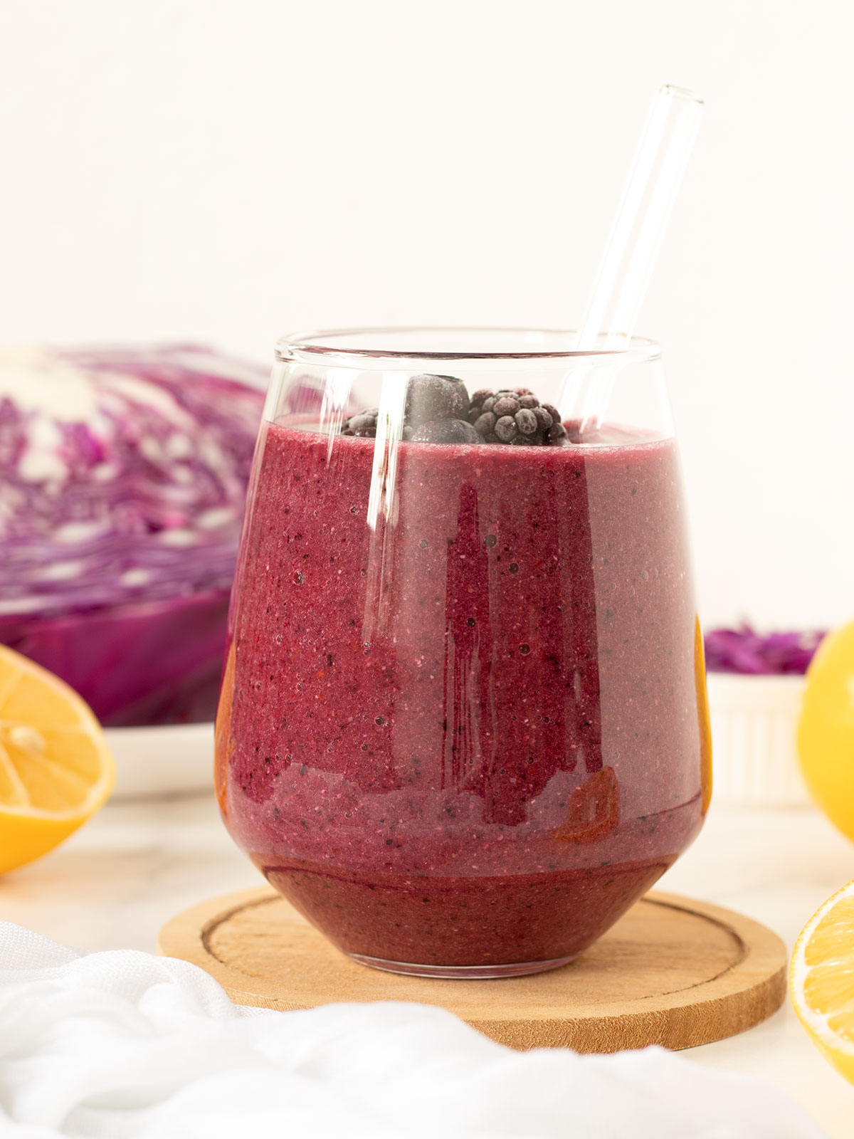 Vegan red cabbage smoothie with banana and mixed berries.