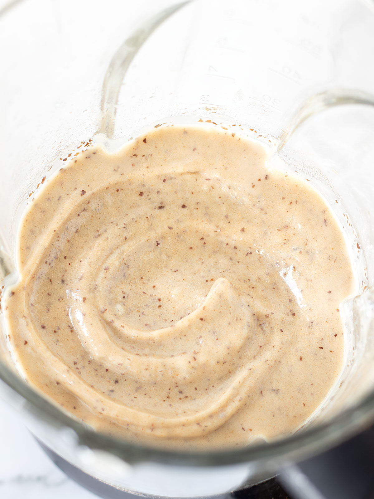 Blending banana date muffins batter.