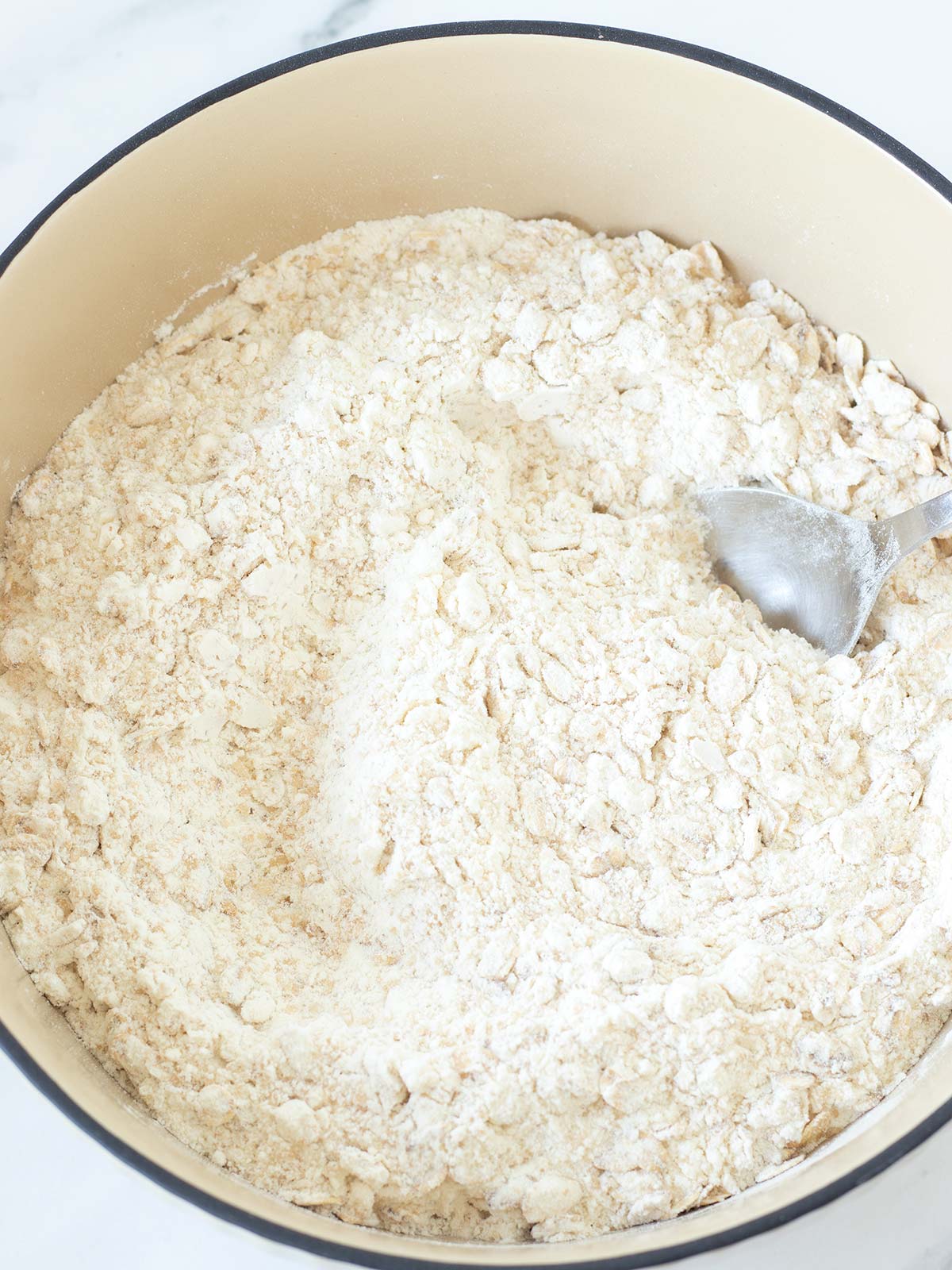 Dry ingredients for blueberry banana oat muffins.