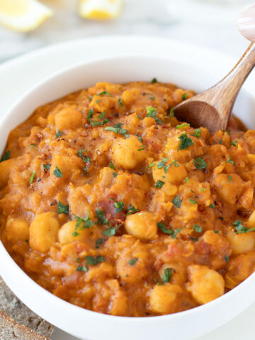 Vegan red lentil chickpea curry with coconut milk.