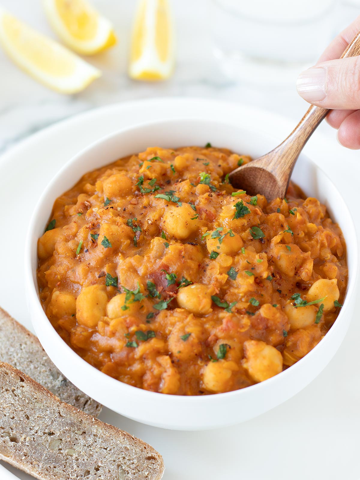 Vegan red lentil chickpea curry with coconut milk.