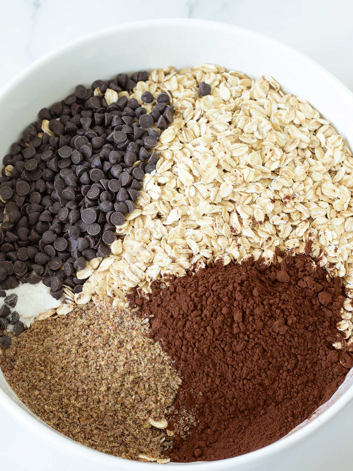 Dry ingredients for chocolate chip baked oats.