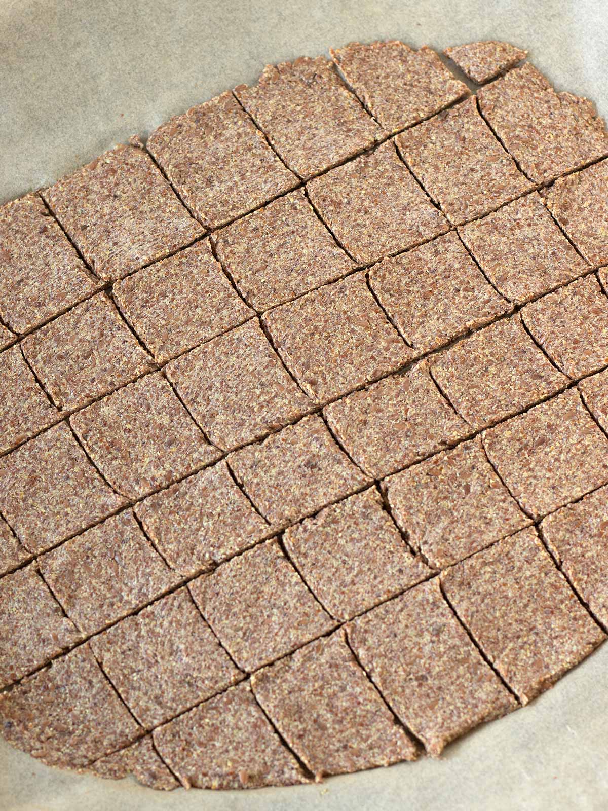 Flax seed crackers prepared for baking.