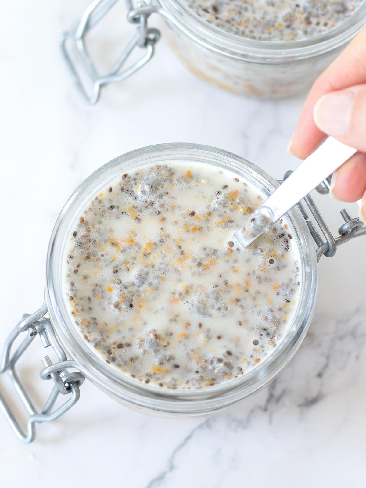 Meal prepping peanut butter chia pudding.
