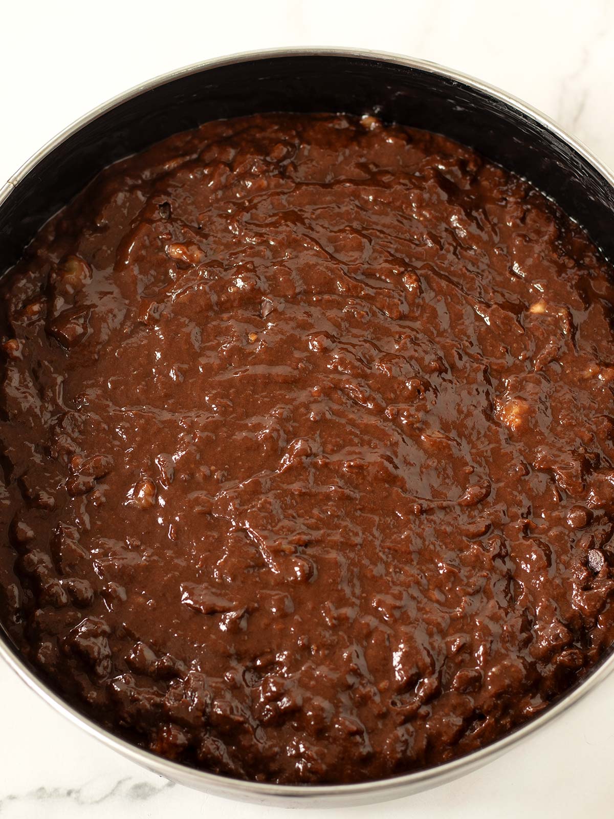 Vegan chocolate banana cake prepared for baking.