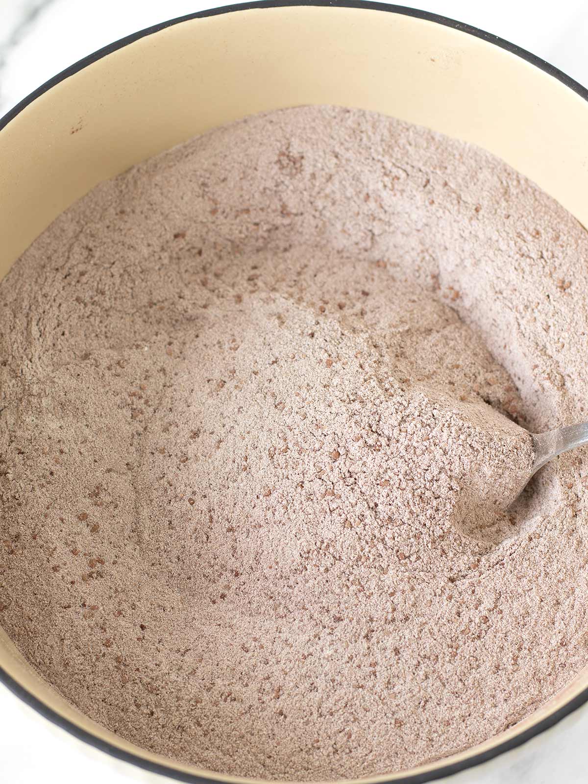 Dry ingredients for vegan buckwheat flour cake.
