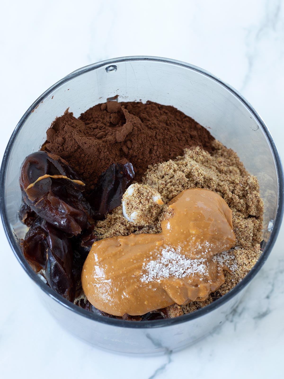 Flaxseed cookies ingredients in a food processor.