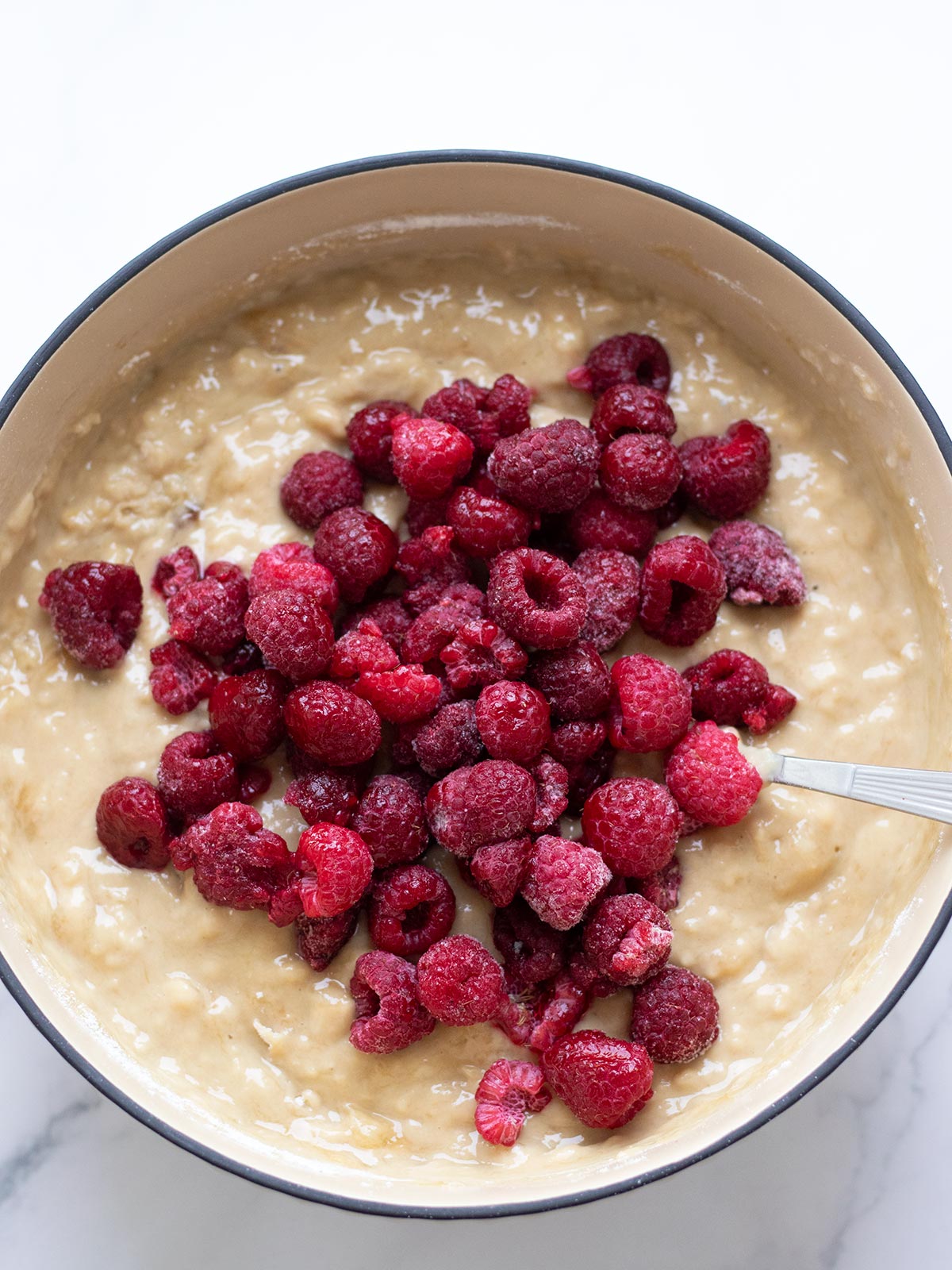 Raspberry banana muffins batter.