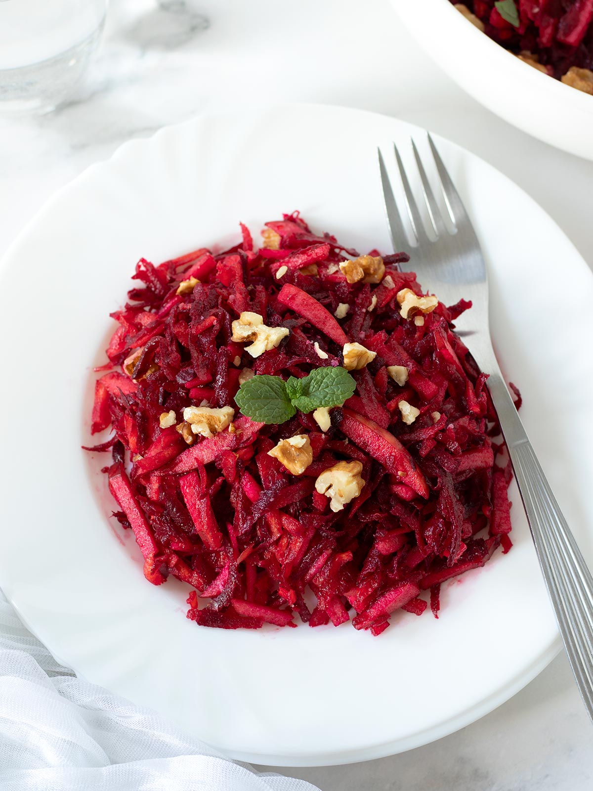 Raw beetroot apple carrot walnut salad.