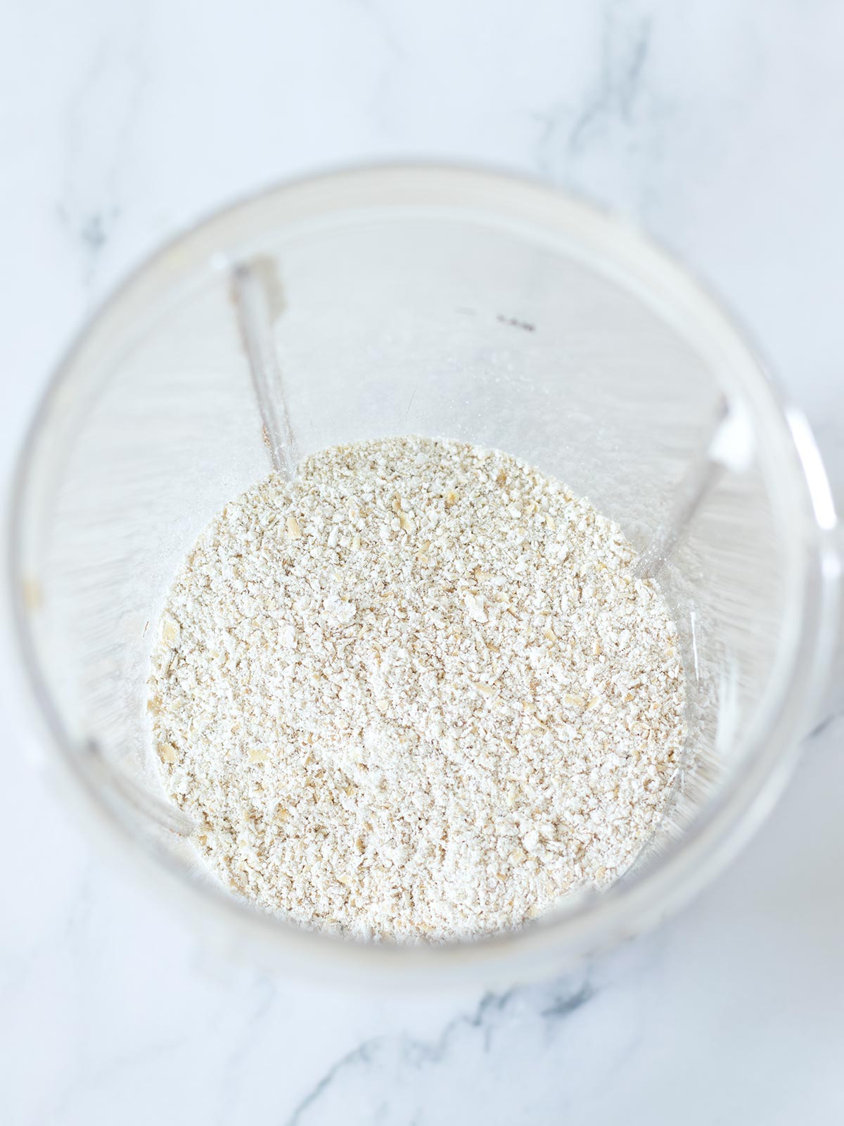 Blended oats for protein banana pancakes.