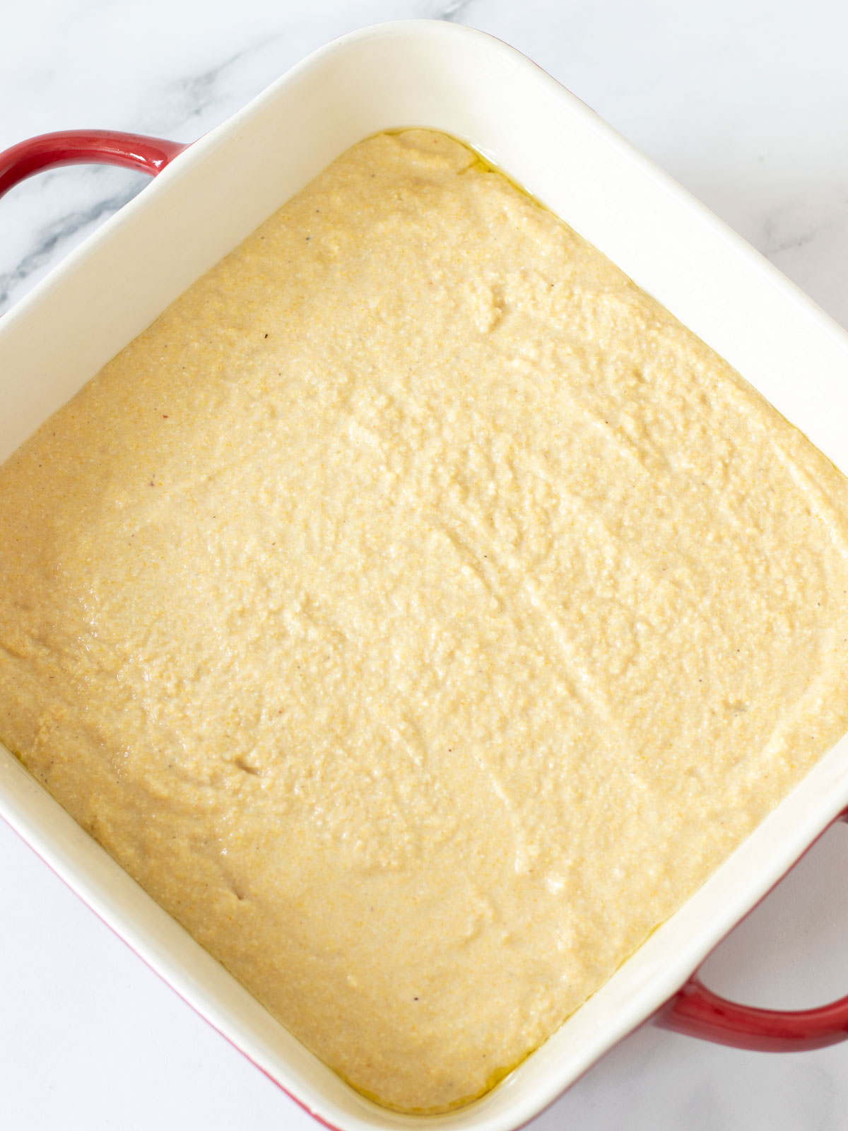 Vegan cornbread prepared for baking.