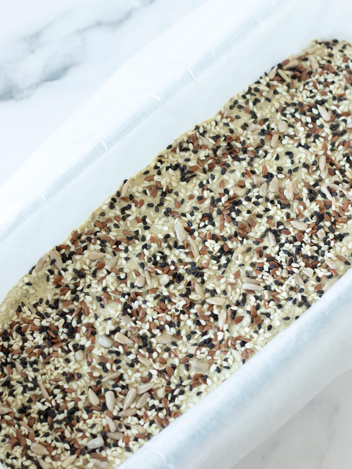 Gluten-free quinoa bread prepared for baking.