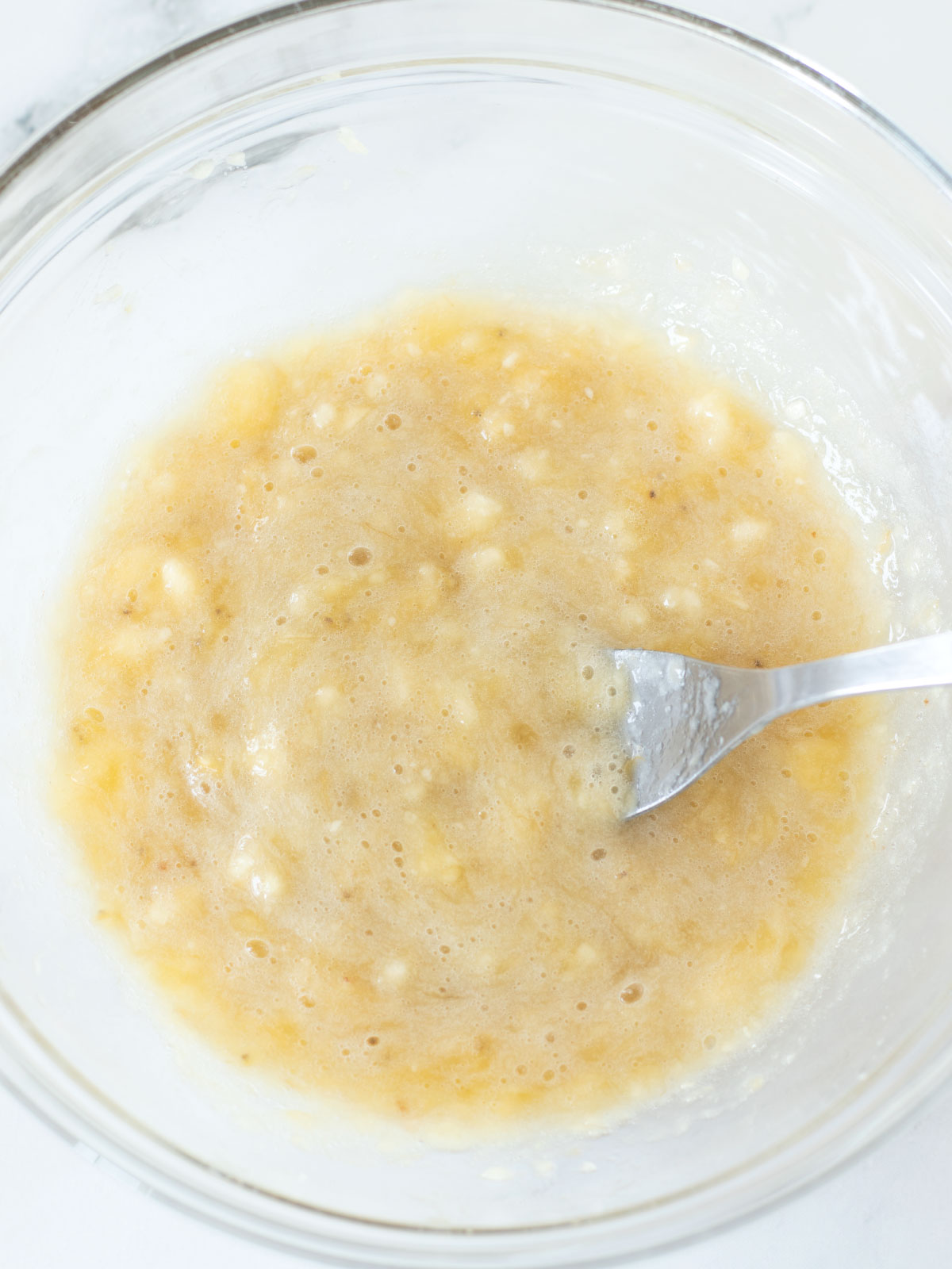 Mashed banana for chickpea flour pancakes.