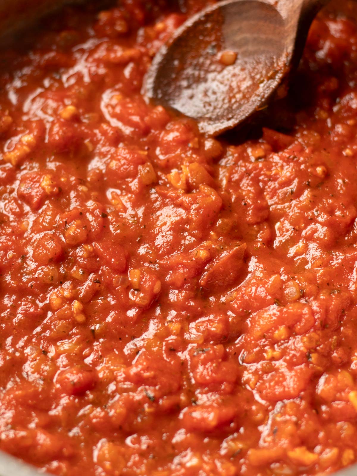Cooking tomato tofu pasta sauce.