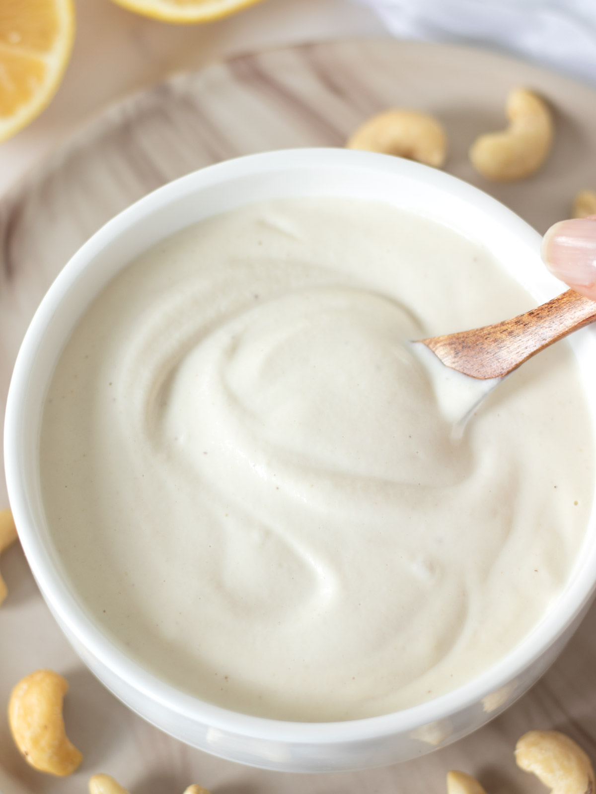 Vegan cashew cream (plant-based substitute).